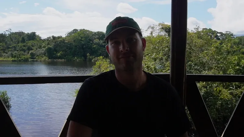 Traveler on the terrace at Zacambú Rainforest Ecolodge | Amazon Jungle Trips