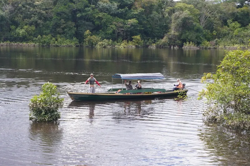 Motorboat with travelers on Lake Zacambú | Amazon Jungle Trips