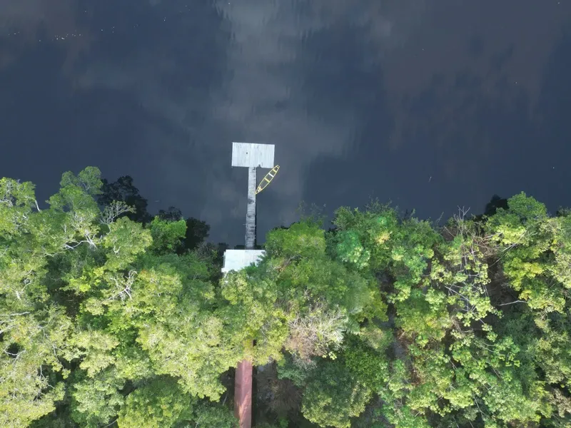 Drone view of the bridge to Lake Zacambú from Zacambú Eco Lodge | Amazon Jungle Trips